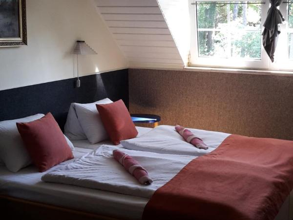 Berg Toboz Panzió : photo 3 de la chambre chambre triple