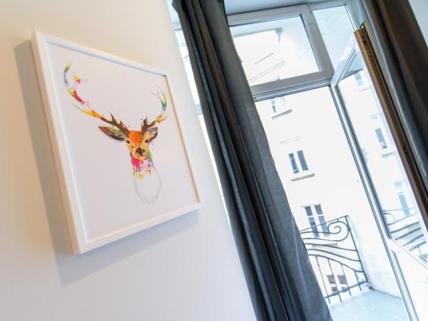 Constitution Square Rooms : photo 2 de la chambre chambre quadruple avec balcon