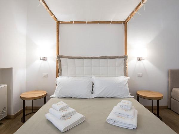 B&B Il Palazzotto Luxury Suites : photo 1 de la chambre chambre quadruple avec balcon