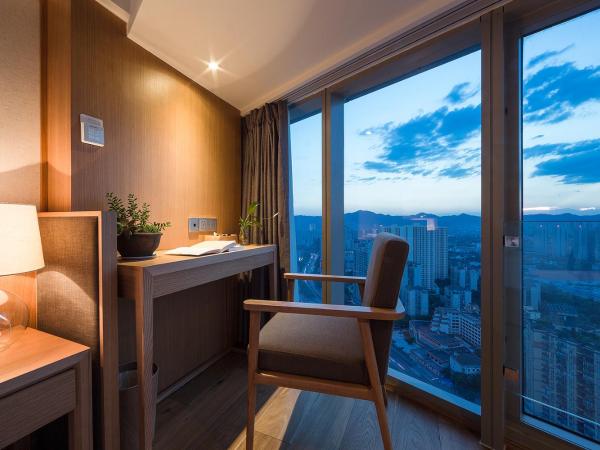 Bai Yun Qin She Boutique : photo 9 de la chambre chambre lits jumeaux deluxe - vue sur ville