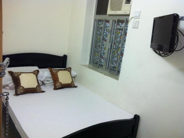 Hung Fai Guest House : photo 10 de la chambre chambre double