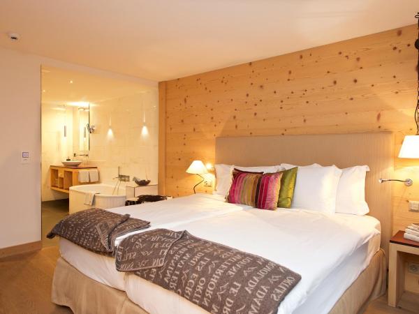 Matterhorn Lodge Boutique Hotel & Apartments : photo 1 de la chambre chalet avec chambre double