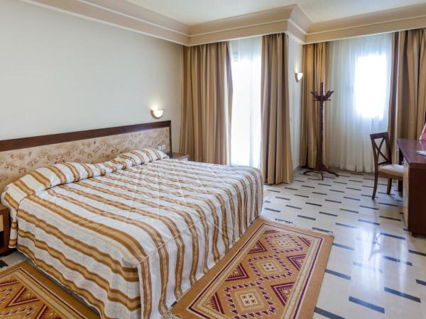 El Mouradi Tozeur : photo 4 de la chambre chambre quadruple