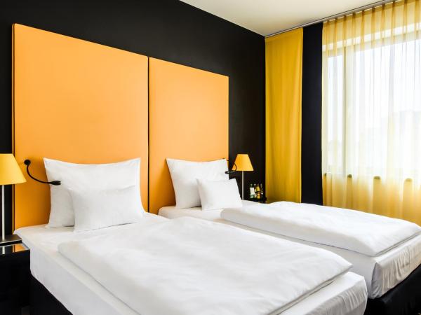 Vienna House Easy by Wyndham Katowice : photo 7 de la chambre chambre lits jumeaux exécutive