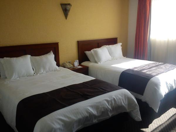 Howard Johnson by Wyndham Morelia Calle Real : photo 8 de la chambre chambre double avec 2 lits doubles - non-fumeurs