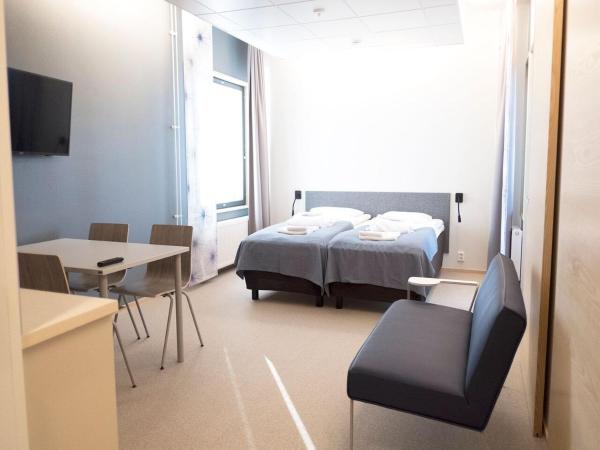 Santasport Resort : photo 2 de la chambre chambre quadruple supérieure avec sauna