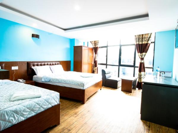 Everest Holiday Inn : photo 1 de la chambre chambre double ou lits jumeaux avec salle de bains privative