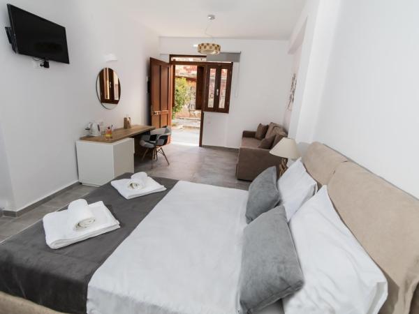 Deluxe Hotel : photo 3 de la chambre chambre triple basique - rez-de-chaussée