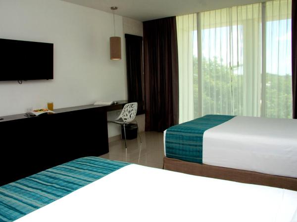 Mesón de la Luna Hotel & Spa : photo 9 de la chambre superior deluxe room with mini refrigerator and garden view, 2 double beds