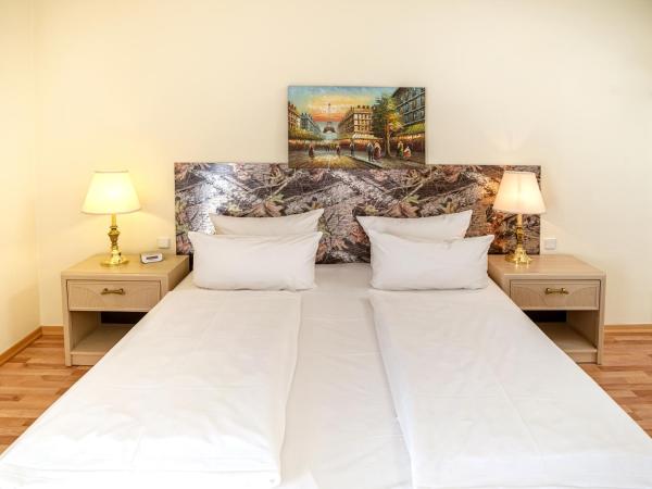 Hotel am Schloß Köpenick by Golden Tulip : photo 2 de la chambre chambre lit king-size standard