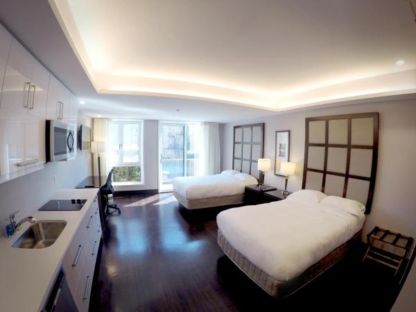 M Montreal Hostel : photo 3 de la chambre studio standard avec 2 lits doubles