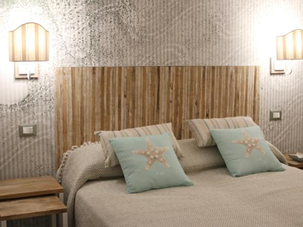 Echi del Mare : photo 7 de la chambre chambre deluxe double ou lits jumeaux