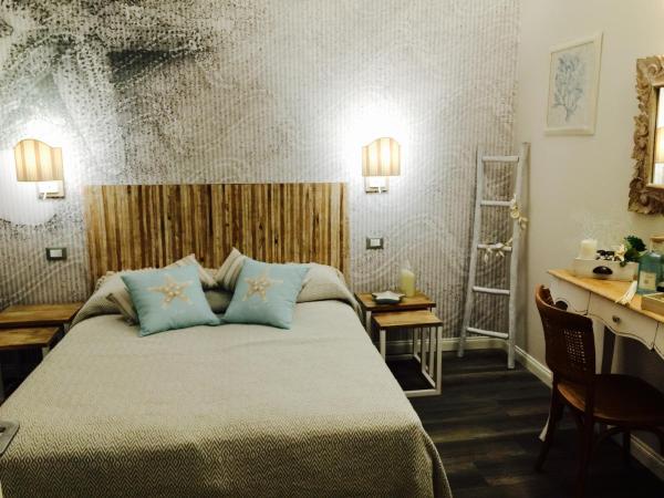 Echi del Mare : photo 1 de la chambre chambre deluxe double ou lits jumeaux