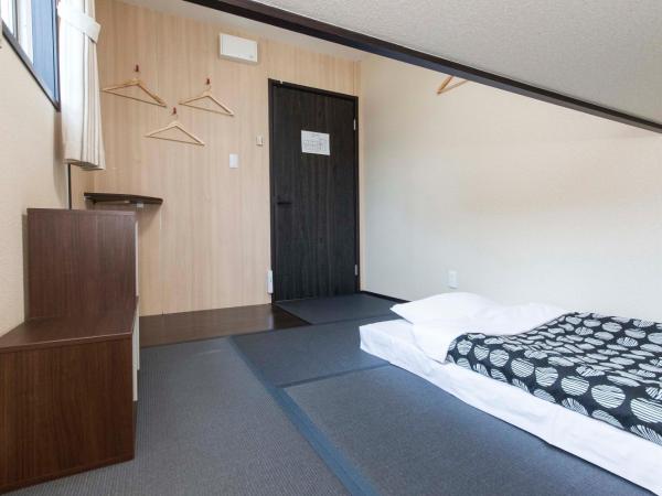Fujitaya BnB : photo 6 de la chambre chambre lits jumeaux avec lit d’appoint - 301
