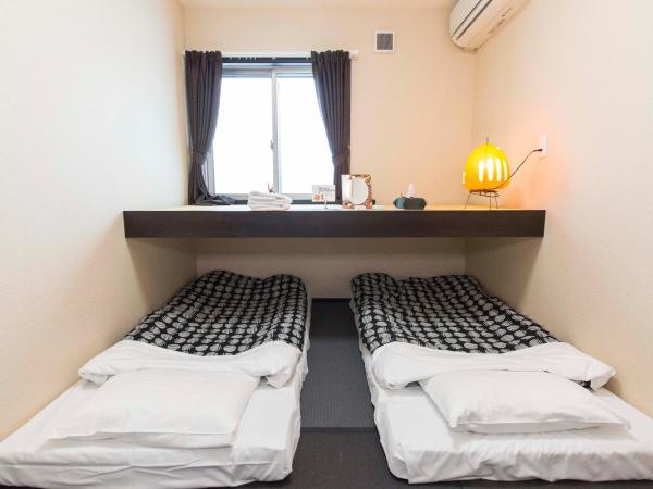 Fujitaya BnB : photo 4 de la chambre chambre lits jumeaux avec lit d’appoint - 301