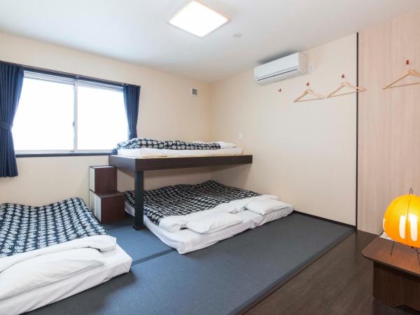 Fujitaya BnB : photo 3 de la chambre chambre quadruple Économique avec salle de bains commune