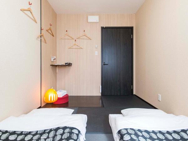 Fujitaya BnB : photo 1 de la chambre chambre lits jumeaux standard avec salle de bains commune