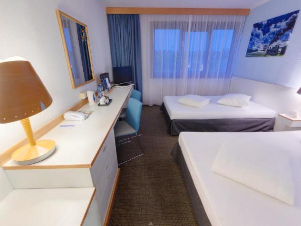 Novotel Poznań Malta : photo 3 de la chambre chambre lits jumeaux