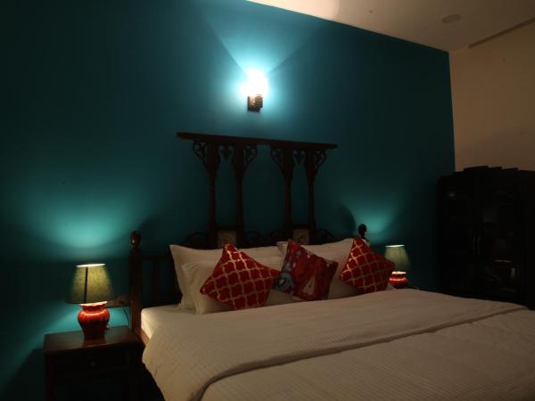 WelcomHeritage Mani Mansion : photo 5 de la chambre chambre lit king-size exécutive