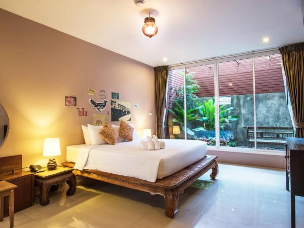 Feung Nakorn Balcony Rooms and Cafe : photo 1 de la chambre suite