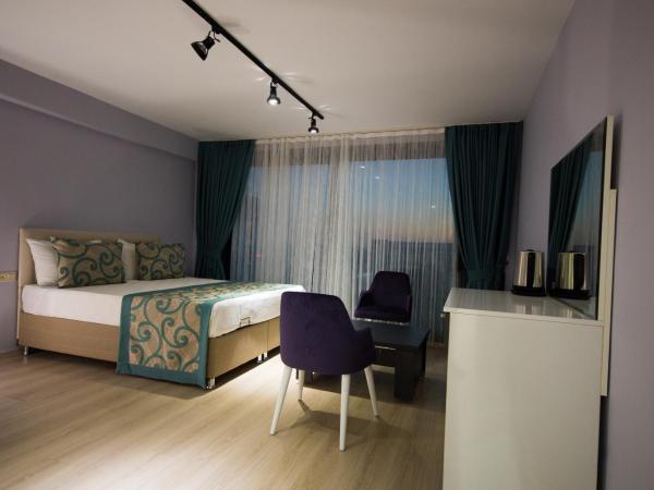 EPS Suite : photo 4 de la chambre chambre lit king-size avec balcon