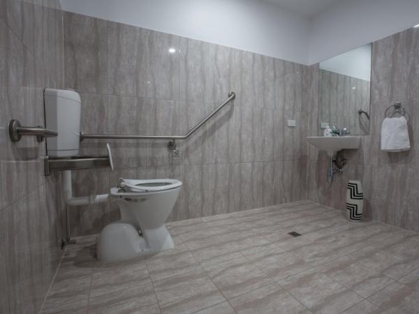 The Palms Apartments : photo 3 de la chambre deluxe two-bedroom/ one-bathroom apartment - disability access - non pet friendly