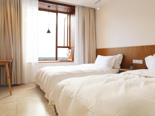 Wei Wen Inn : photo 10 de la chambre chambre double ou lits jumeaux standard - vue sur jardin