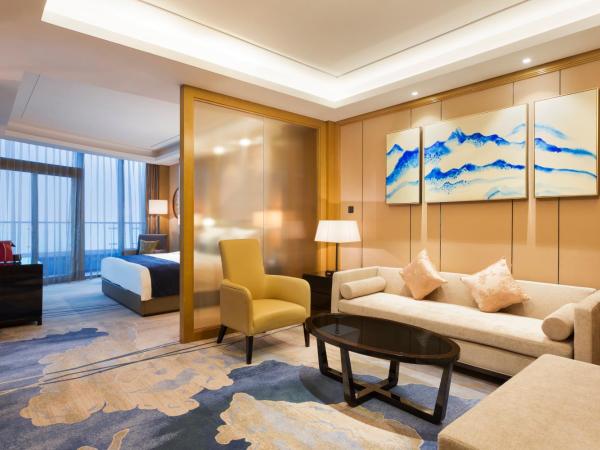 Wyndham Chongqing Yuelai : photo 5 de la chambre chambre club premium lit king-size