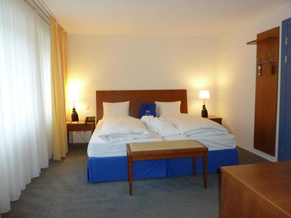 Le Bristol Leukerbad : photo 2 de la chambre chambre supérieure avec 2 lits simples