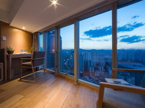 Bai Yun Qin She Boutique : photo 4 de la chambre chambre lits jumeaux deluxe - vue sur ville