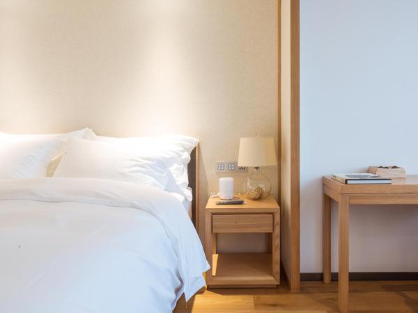 Bai Yun Qin She Boutique : photo 3 de la chambre chambre supérieure lit queen-size