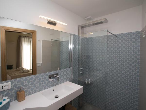 Le Quattro Stagioni - Rooms & Suite : photo 9 de la chambre suite avec balcon