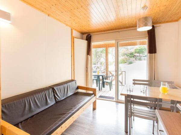 Village Vacances Le Parc Des Chênes (by Popinns) : photo 5 de la chambre chalet 2 chambres (4 personnes)