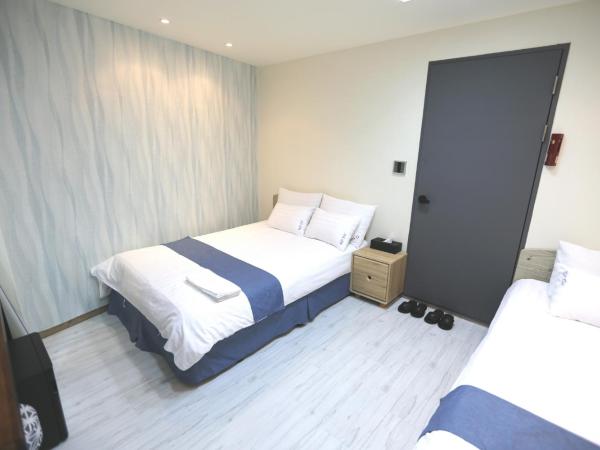 Must Stay Hotel Myeongdong : photo 1 de la chambre chambre triple