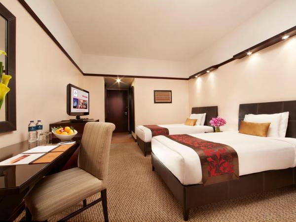 Millennium Hotel Sirih Jakarta : photo 1 de la chambre chambre lits jumeaux deluxe