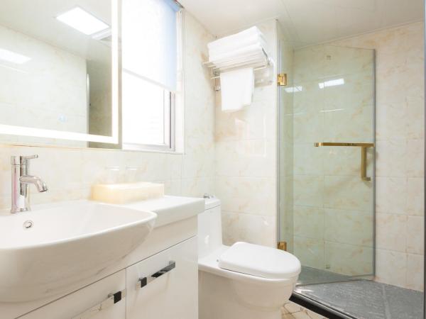 Guangzhou Compass Hotel : photo 4 de la chambre chambre lit king-size - vue sur jardin