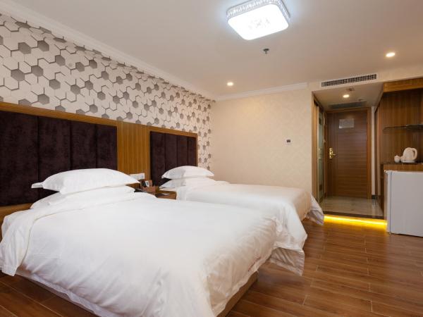 Guangzhou Compass Hotel : photo 4 de la chambre chambre lits jumeaux supérieure