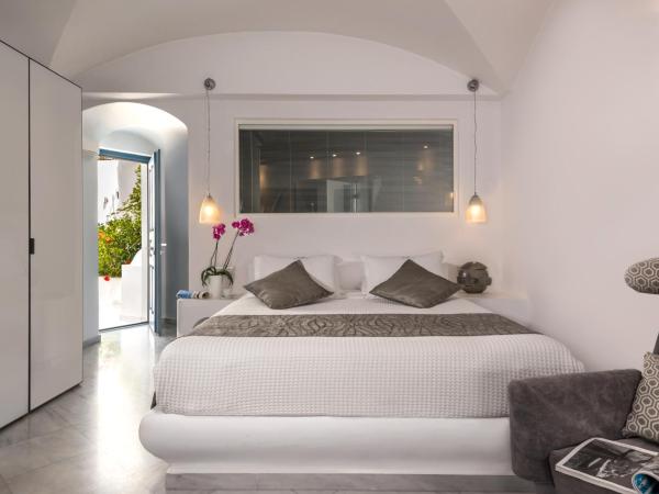 Anteliz Suites : photo 8 de la chambre suite avec piscine à débordement privée - vue sur caldeira