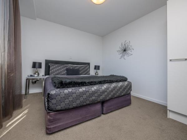 Bellano Motel Suites : photo 4 de la chambre appartement 1 chambre de luxe avec baignoire spa