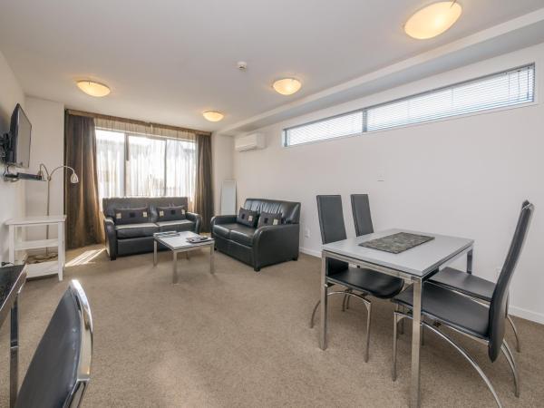 Bellano Motel Suites : photo 5 de la chambre appartement 1 chambre de luxe avec baignoire spa