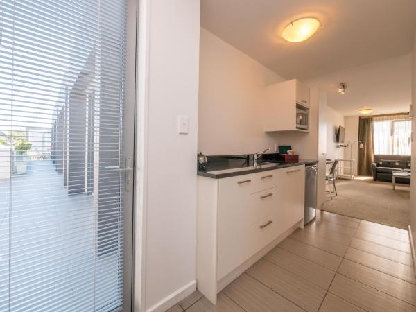 Bellano Motel Suites : photo 6 de la chambre appartement 1 chambre de luxe avec baignoire spa