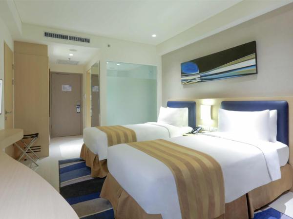 Holiday Inn Express Jakarta International Expo, an IHG Hotel : photo 4 de la chambre chambre supérieure lits jumeaux