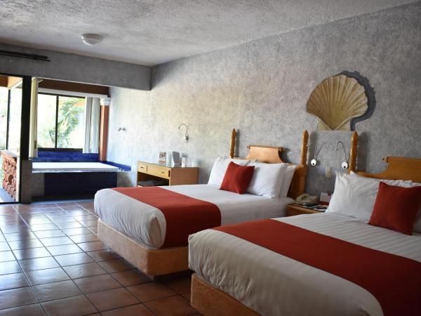 Hosteria Las Quintas Hotel Restaurante Bar : photo 3 de la chambre suite avec 2 lits doubles et baignoire spa