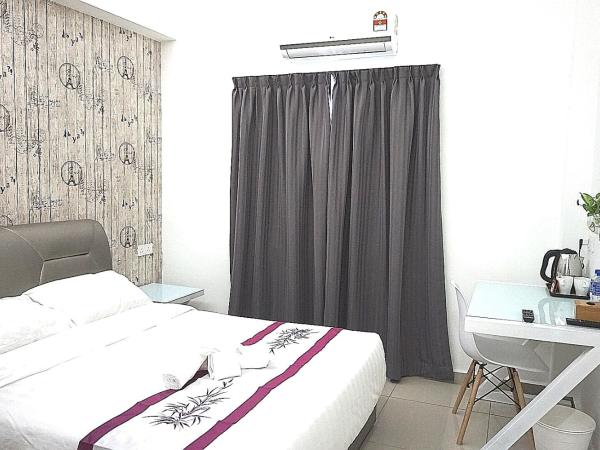 D' Cozy Inn : photo 2 de la chambre chambre double ou lits jumeaux avec salle de bains