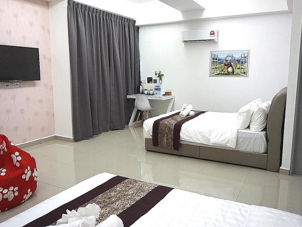 D' Cozy Inn : photo 3 de la chambre chambre quadruple avec salle de bains privative