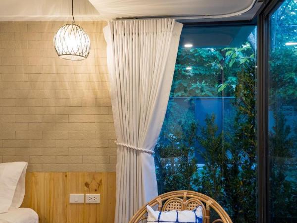 18 In Town Homestay : photo 3 de la chambre chambre lits jumeaux