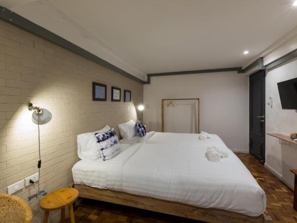 18 In Town Homestay : photo 8 de la chambre chambre lits jumeaux