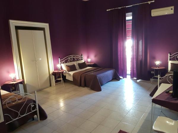 Hotel Biscari : photo 1 de la chambre chambre quadruple avec balcon