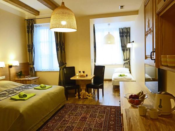 Ośrodek Wypoczynkowy Tatrzańska : photo 3 de la chambre chambre familiale avec salle de bains