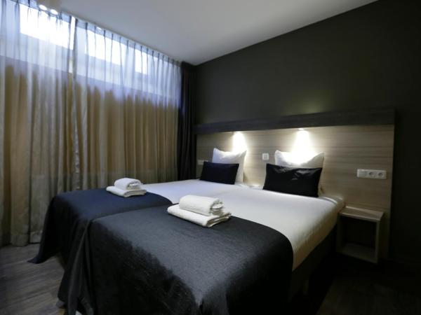 City Hotel Amsterdam : photo 3 de la chambre chambre lits jumeaux en sous-sol